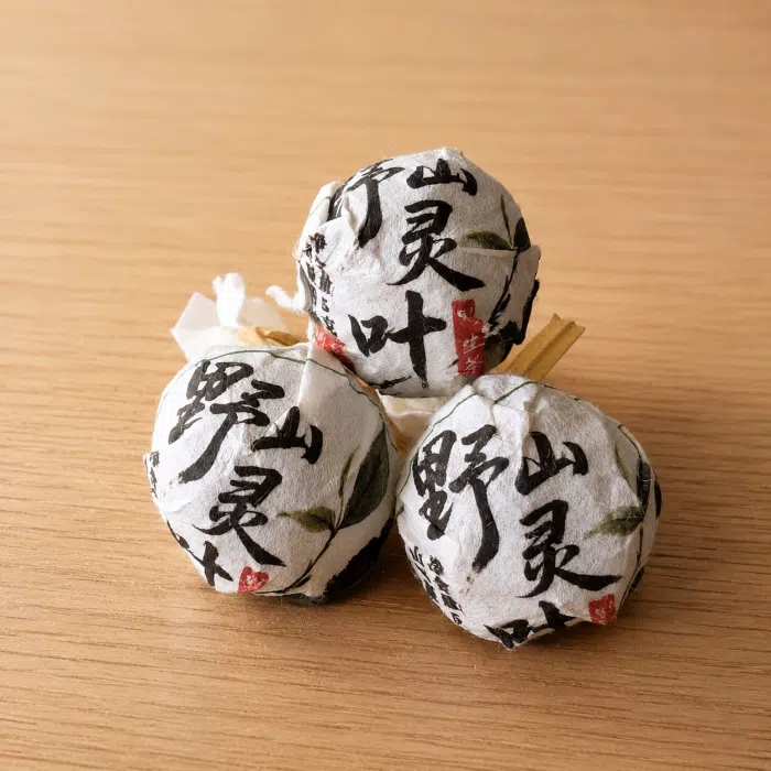 2025 "Wild Mountain Spirit Leaf" Yongde Raw Pu Erh Tea Balls — detail 2